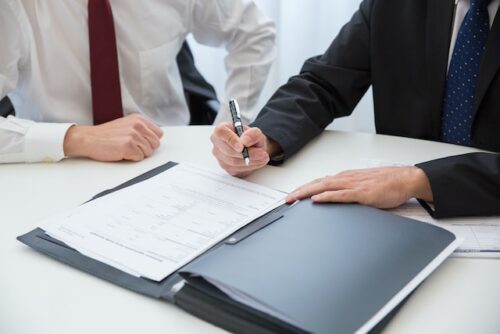 person looking at documents