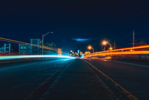 dark road with streetlights