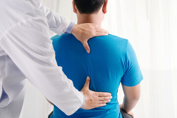 doctor and man with spine injury