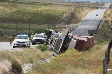 truck tipped over on highway