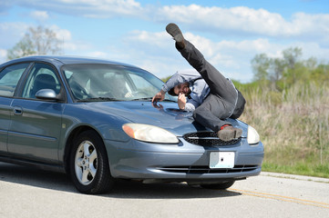 man getting hit by a car