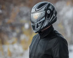 person wearing motorcycle helmet